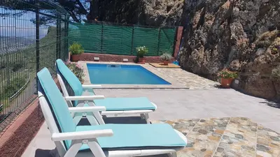 Piscina en o cerca de Casa Cueva Paquito