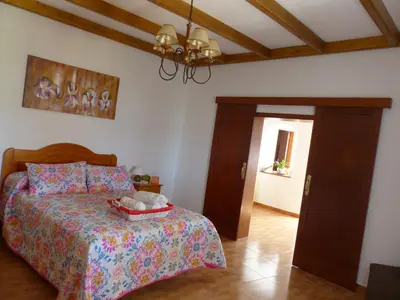 Cama o camas de una habitación en Casa Cueva Paquito