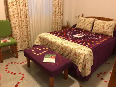 Cama o camas de una habitación en Holiday Home 1-Schlafzimmer-Superior-Apartment by Interhome