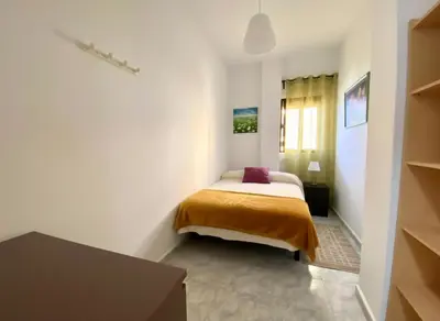 Cama o camas de una habitación en Al Magec Vacacional