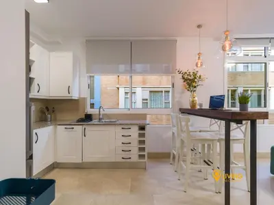 Una cocina o zona de cocina en Living Las Canteras Homes - Beachside Spa Parking