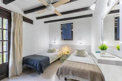 Cama o camas de una habitación en Arpones 1 by VillaGranCanaria
