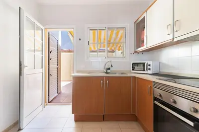 Una cocina o zona de cocina en Bungalow - Playa Maspalomas
