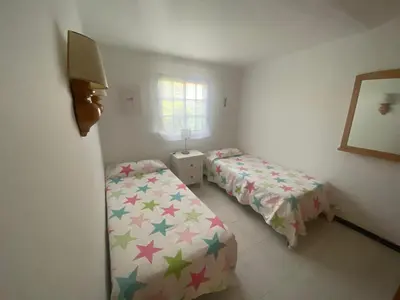 Cama o camas de una habitación en Fantástico Bungalow Santa Clara
