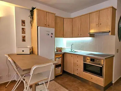 Una cocina o zona de cocina en Apartamento Costero con Piscina en Telde