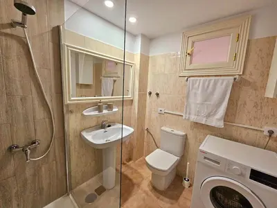 Un baño de Apartamento Costero con Piscina en Telde