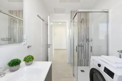 Un baño de Calma Costera 1B by VillaGranCanaria