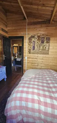 Cama o camas de una habitación en CABAÑA Mirador de las Lagunetas