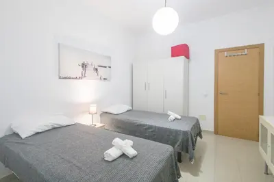 Cama o camas de una habitación en La Casita de Bruno Balcony House
