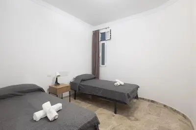 Cama o camas de una habitación en GuestReady - La Suerte cerca Los Alisios