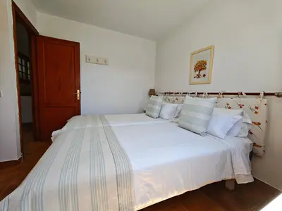 Cama o camas de una habitación en Bungalow with great garden, los Tunos