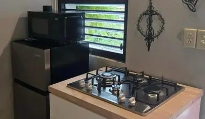 Una cocina o zona de cocina en Duna Camping Maspalomas Gran Canaria South Sur
