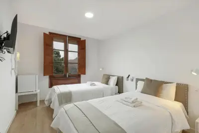 Cama o camas de una habitación en TeXeda Room Suites 4