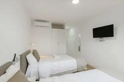 Cama o camas de una habitación en TeXeda Room Suites 4
