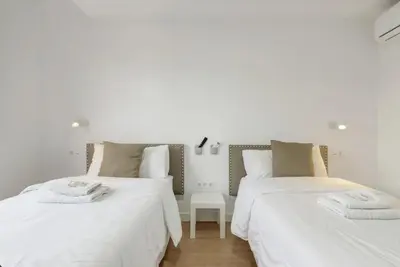 Cama o camas de una habitación en TeXeda Room Suites 4
