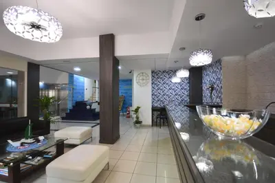 Una televisión o centro de entretenimiento en Apartamentos Tinoca