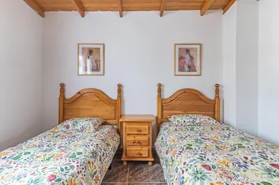 Cama o camas de una habitación en Home2Book Cozy Rural House with Terrace and Views