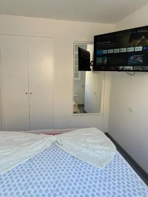 Cama o camas de una habitación en Luliche estudio