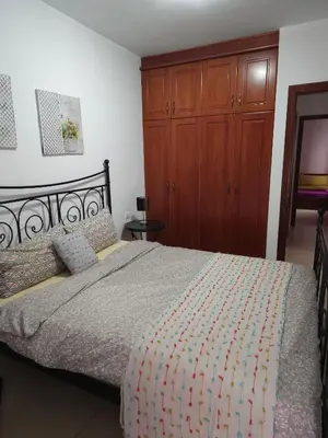 Cama o camas de una habitación en Charming Holiday House in Las Palmas with City Views