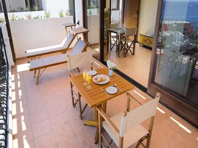 Un balcón o terraza de Idyll Suites - Adults Only