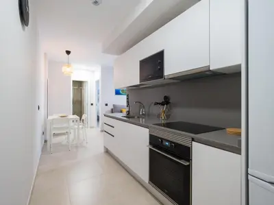 Una cocina o zona de cocina en Acogedor apartamento en Las Canteras