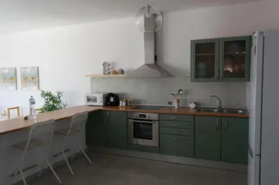 Una cocina o zona de cocina en Apartamento en primera línea de la playa