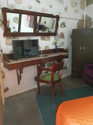 Una televisión o centro de entretenimiento en La Piedra Viva Agüimes , Siete hermanos