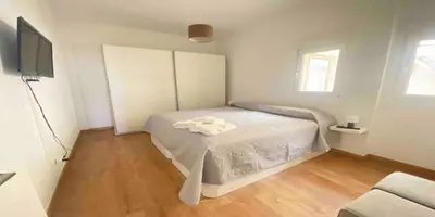 Cama o camas de una habitación en Penthouse Canteras Center