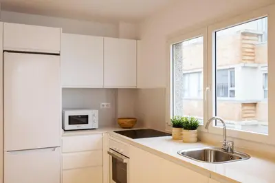 Una cocina o zona de cocina en Beachfront apartment in Las Canteras S5