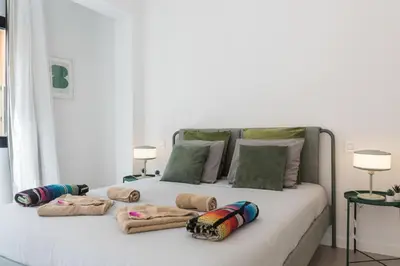 Cama o camas de una habitación en Bright Apt for 4 Las Canteras - Shared Terrace