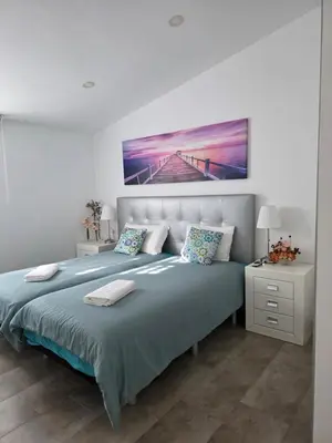 Cama o camas de una habitación en Faro Quilla 8 PASITO BLANCO Deluxe