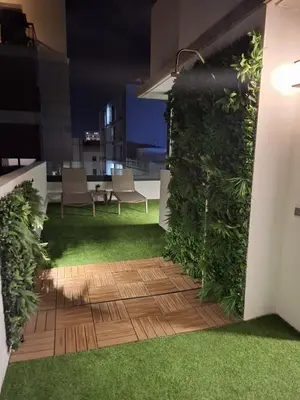 Jardín al aire libre en RK Costa Suites