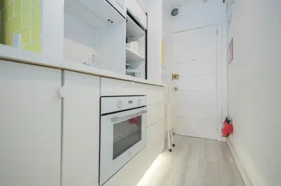 Una cocina o zona de cocina en Vintage Flat - Terrace & Pool