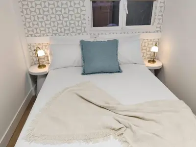Cama o camas de una habitación en Blue Wave