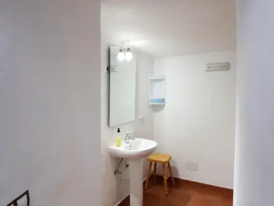 Un baño de Cuevas De Barreto