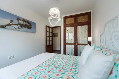 Cama o camas de una habitación en Casa Panchita -Maravillosas vistas al mar y montaña