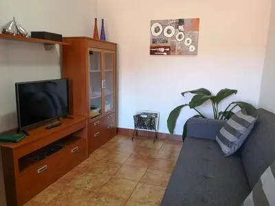 Una televisión o centro de entretenimiento en Vivienda Vacacional La Portada