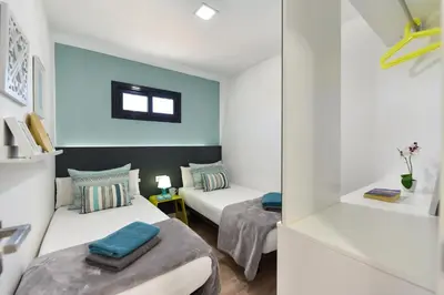 Cama o camas de una habitación en Cozy bungalow for 6 in Playa del Inglés GD04 by VillaGranCanaria