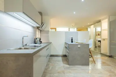 Una cocina o zona de cocina en Suites Garden Loft El Greco