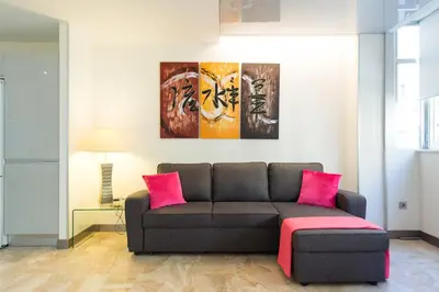 Zona de estar de Suites Garden Loft El Greco