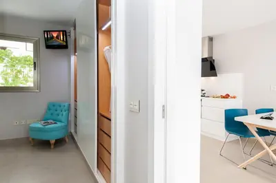 Una televisión o centro de entretenimiento en Apartment Playa del Aguila NE/IM