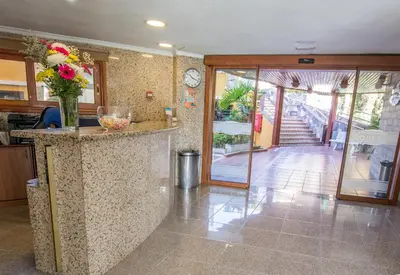 El vestíbulo o zona de recepción de Apartamentos Los Tilos