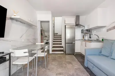 Una cocina o zona de cocina en Home2Book Relaxing Stay & Terrace in Maspalomas