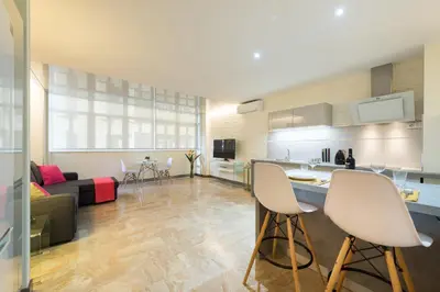 Una cocina o zona de cocina en Suites Garden Loft Picasso