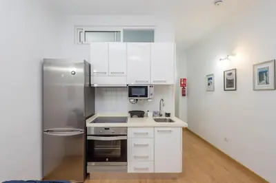 Una cocina o zona de cocina en GuestReady - Salvador Cuyas 17 - Apto 104 - FC