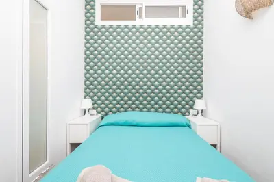 Cama o camas de una habitación en GuestReady - Salvador Cuyas 17 - Apto 104 - FC