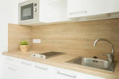 Una cocina o zona de cocina en Bungalows Doña Rosa