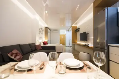 Una cocina o zona de cocina en Suites Garden Loft Munch