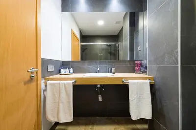 Un baño de Suites Garden Loft Munch