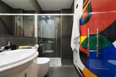 Un baño de Suites Garden Loft Miro
